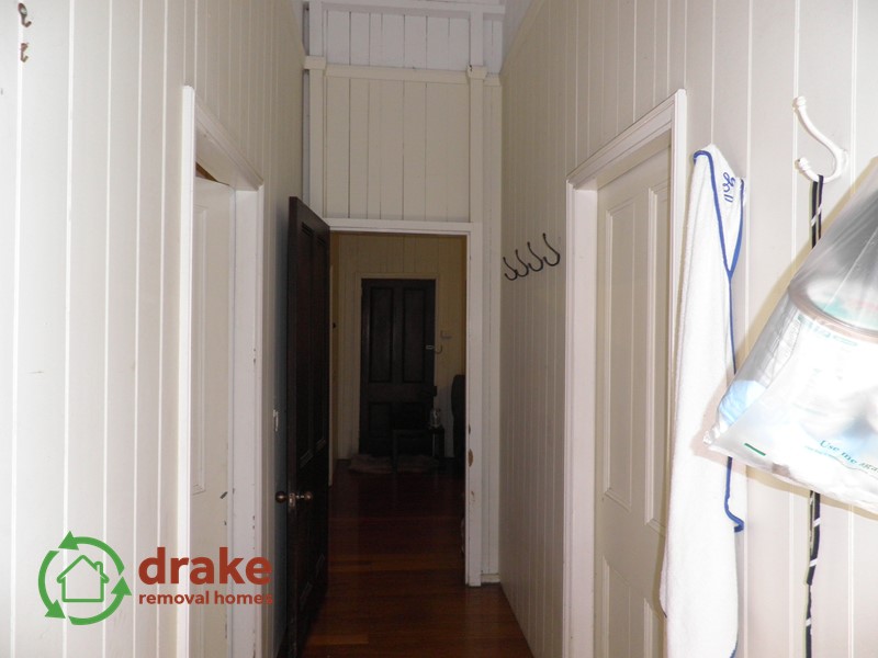 1896 original colonial hallway with hanging hooks